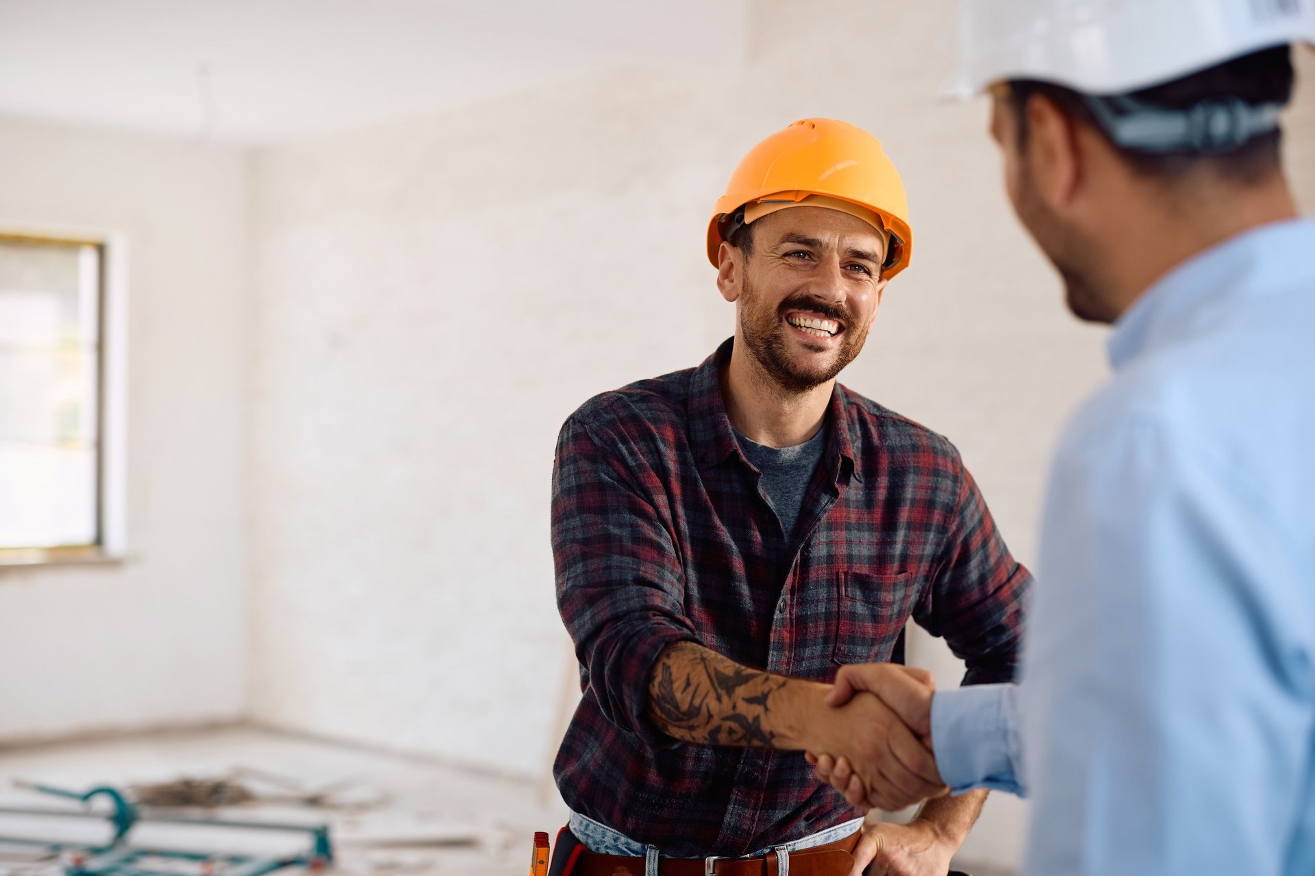 Happy worker handshake